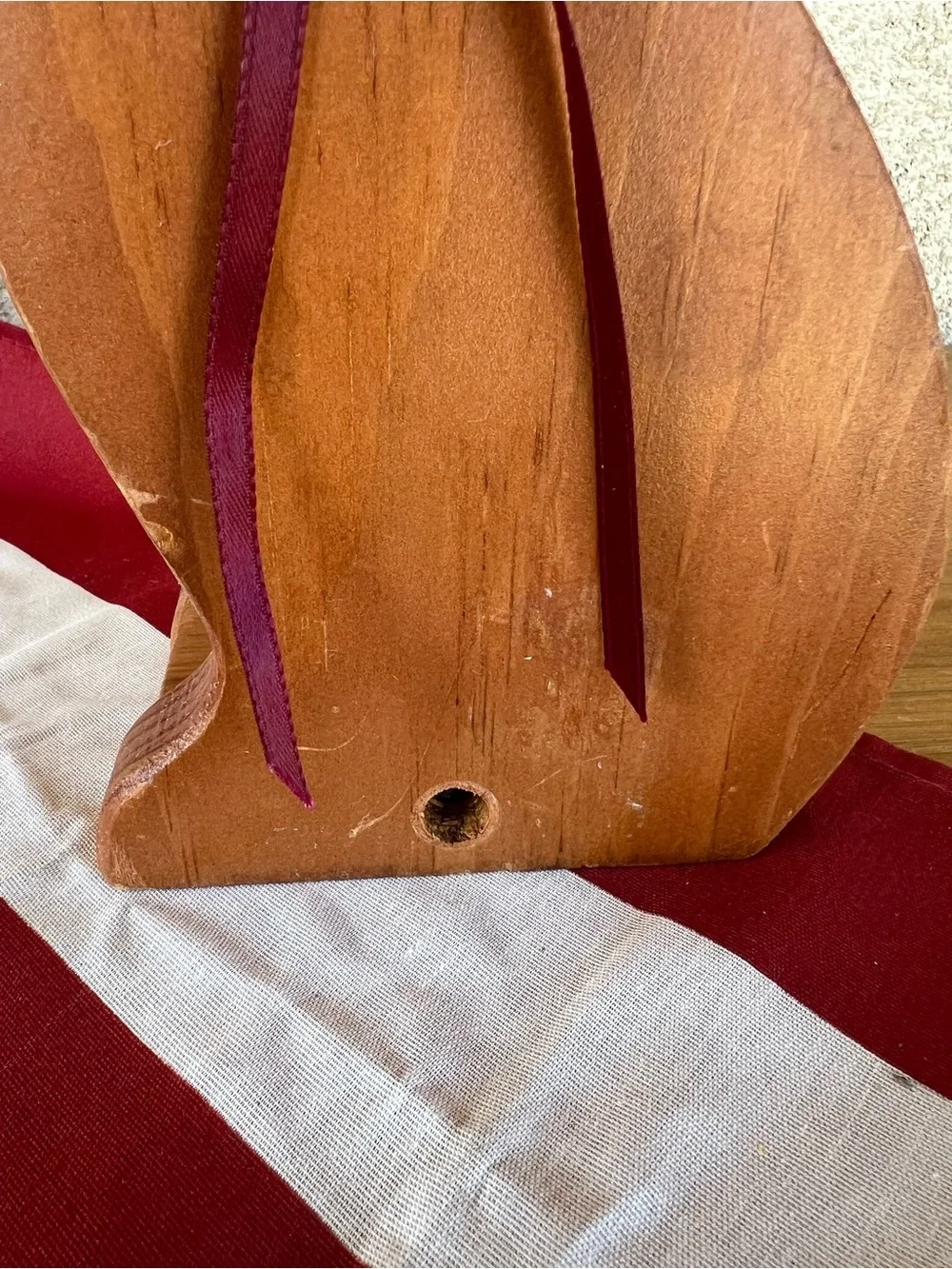 Wooden Cat Figurine with Burgundy Ribbon